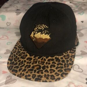 PINK DOLPHIN black and brown cheetah print ball cap hat.